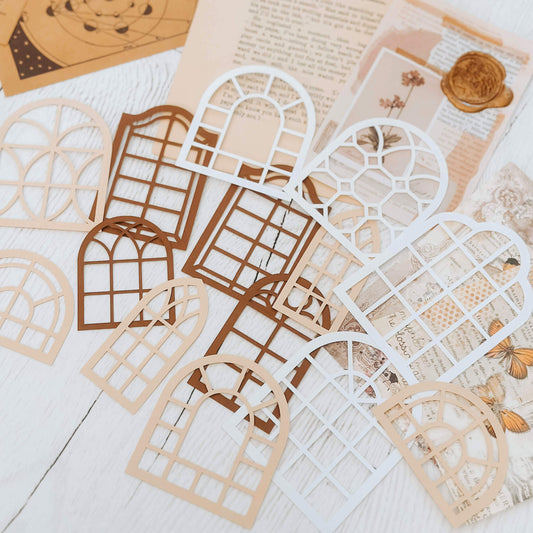 Intricate paper cutouts - Neutral colour windows